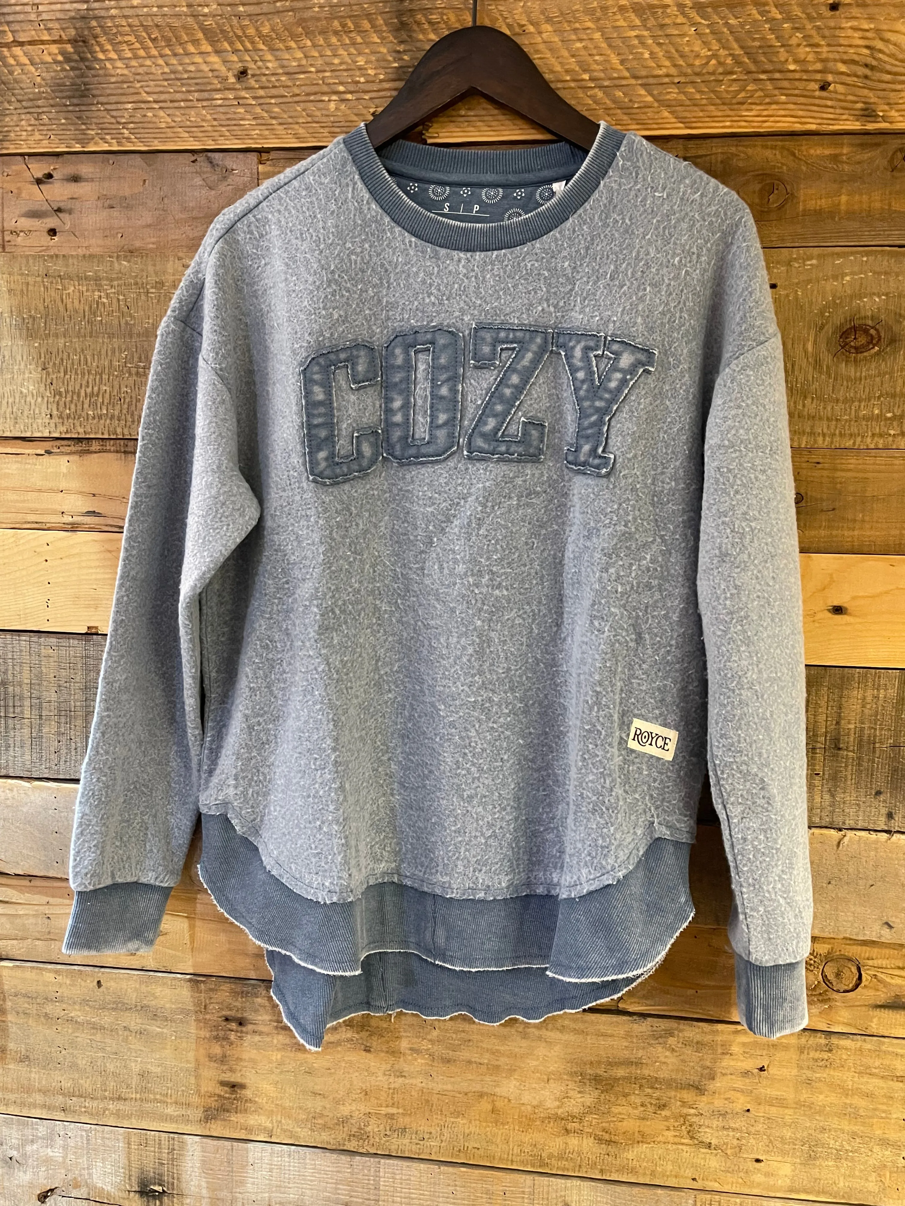 Cozy Applique on Ponchoville Fleece in Bluestone